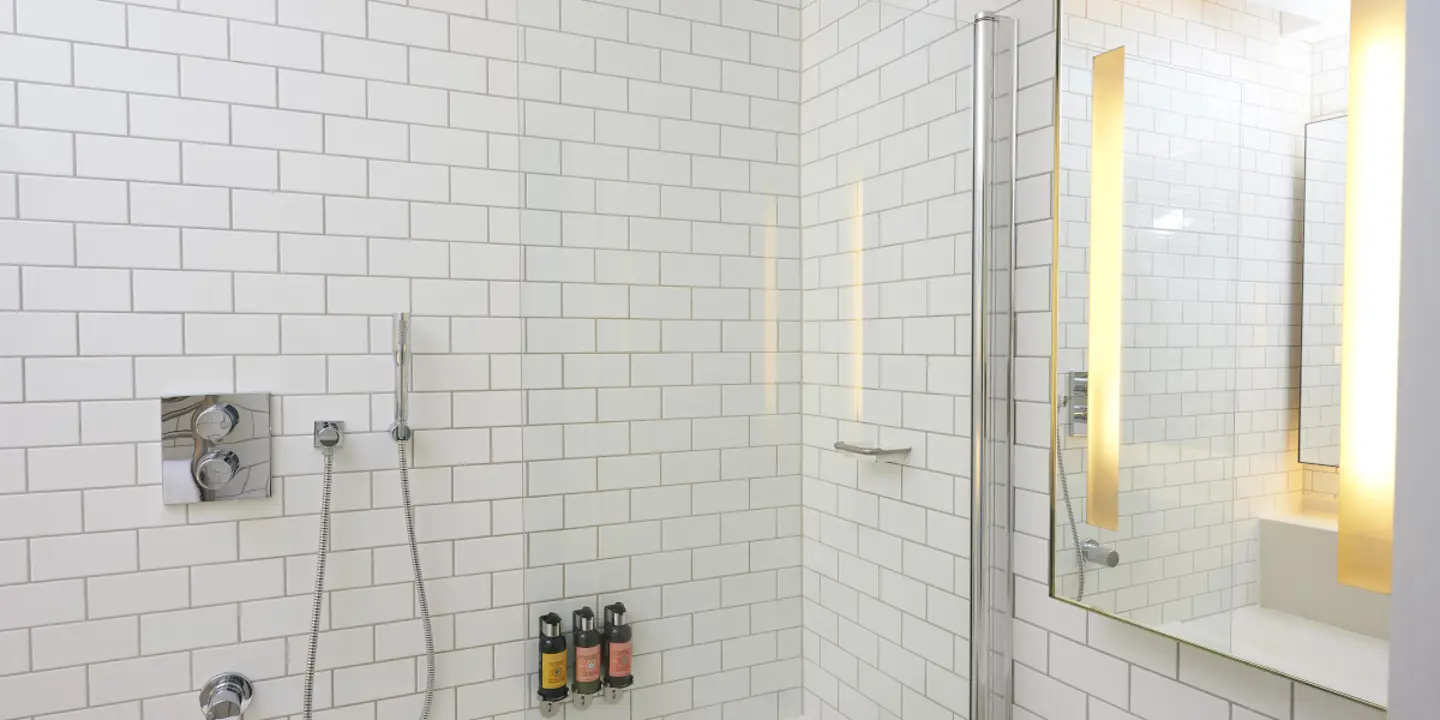 A bathroom featuring a sink, shower and bathtub.