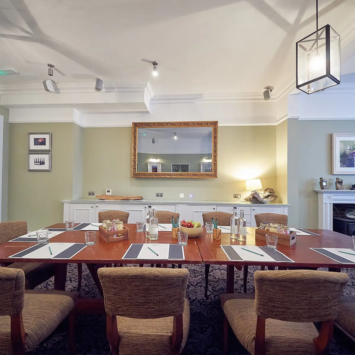 Dining table with neatly arranged place settings