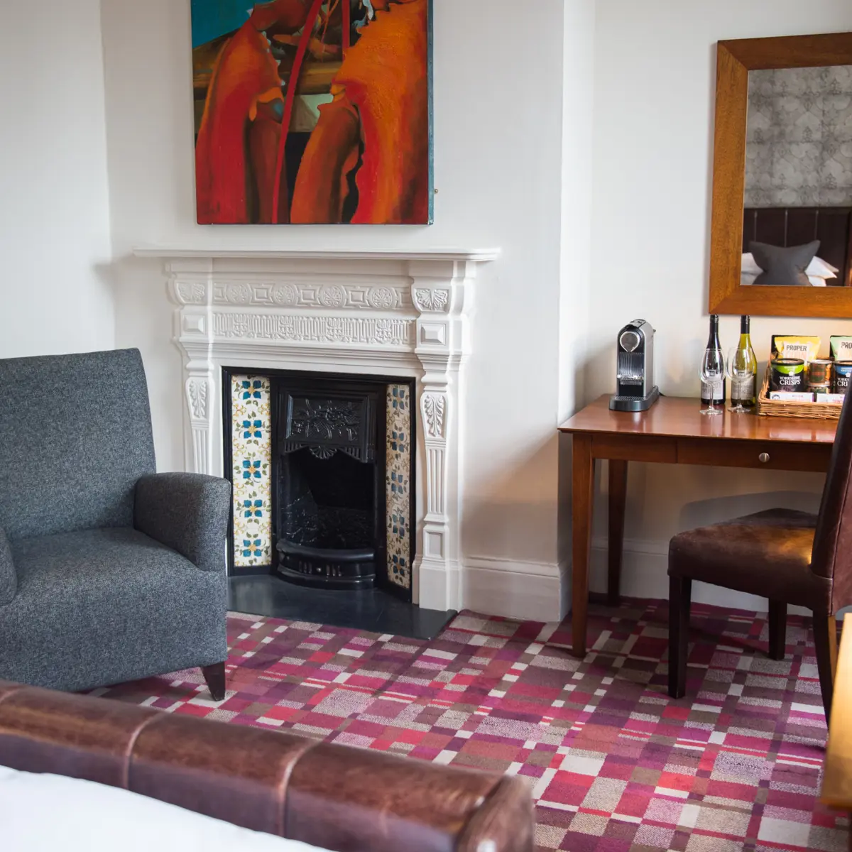 Living room featuring a fireplace and chair.