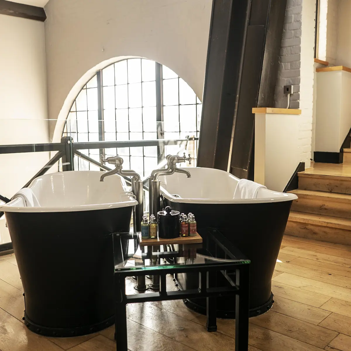 Bathroom with a bathtub placed alongside a sink