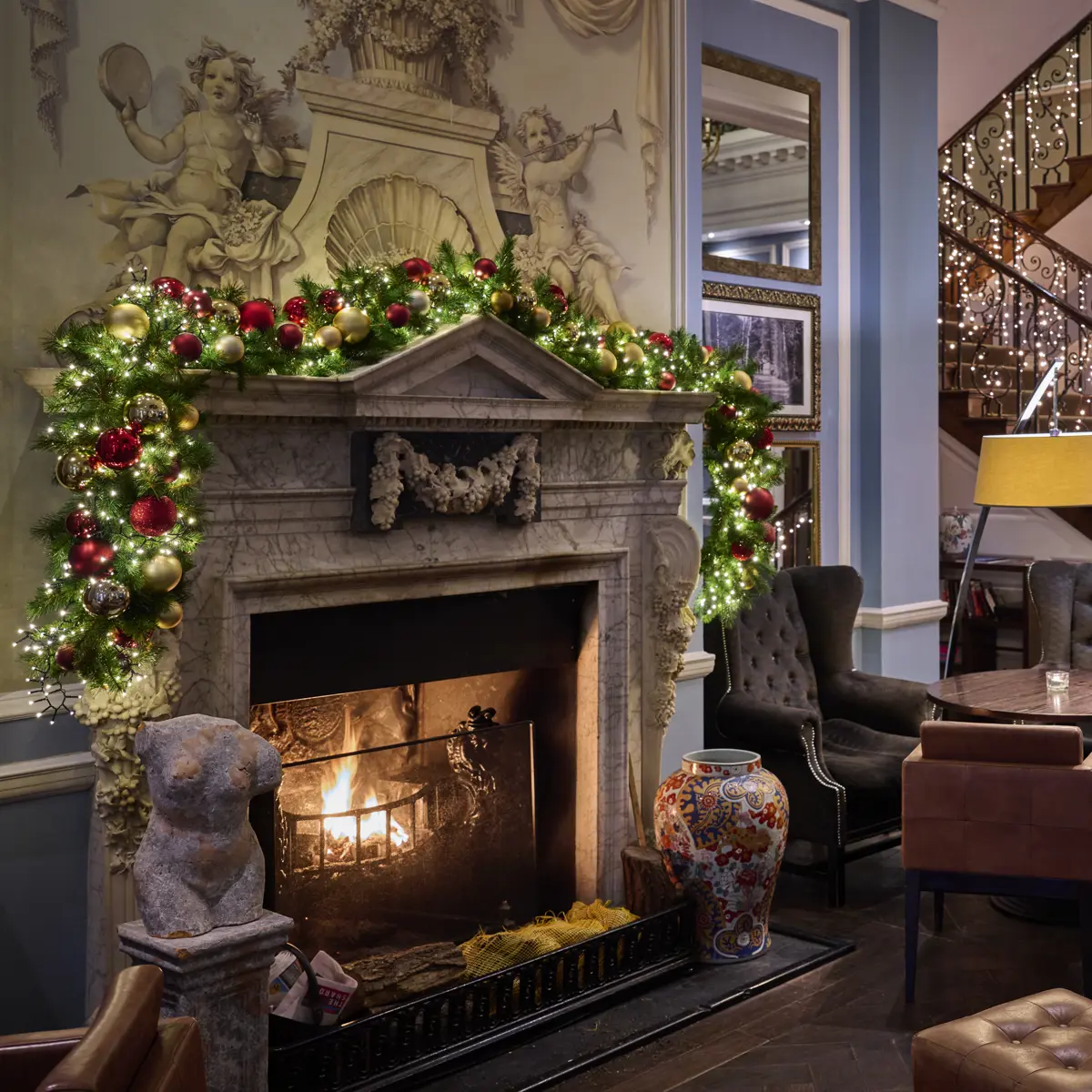 Festive ambience and decorations around a fireplace 